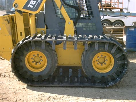 over tire tracks skid steer loaders|aftermarket skid steer track kits.